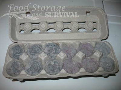 How to make Practically FREE egg carton dryer lint fire starters!  These are the best for camping and emergency fire starting!  from http://foodstorageandsurvival.com
