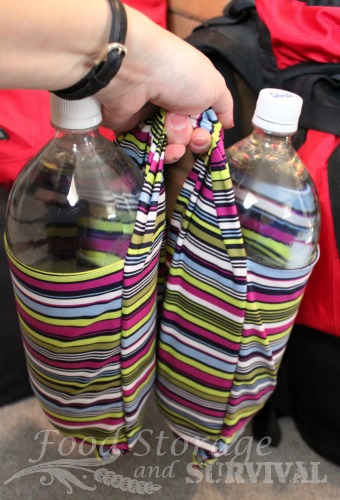 Carry more emergency water!  Easy DIY 2 liter bottle tote to easily carry two bottles in one hand or hook them to your bag!